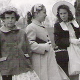 Rivka Olley (right) and two friends standing by the Parade Ground in their Easter finery, ca. 1958.